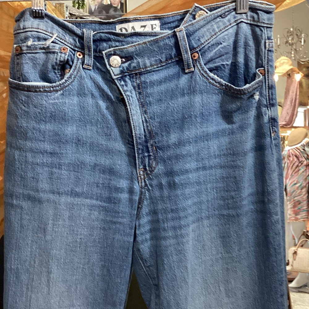 Relaxed fit asym button fly cool. Soft denim 95% cotton denim distressed finish